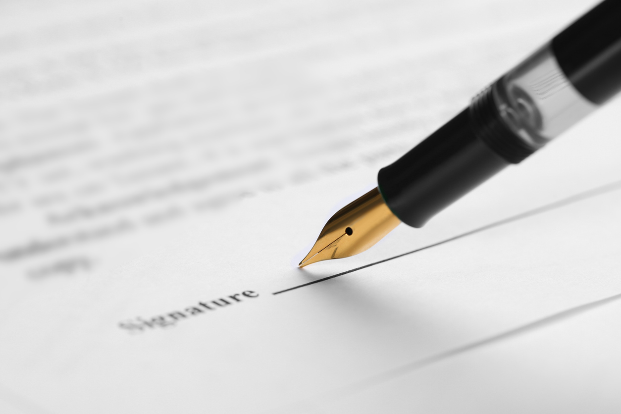 An attorney finalizing a closing letter for a client